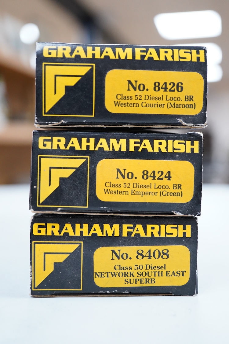 Three boxed Graham Farish N gauge railway diesel locomotives; a BR class 52, Western Courier D1062, (8426), a BR class 52, D1036, (8424) and a Network SouthEast class 50, Superb 50 002 (8408).